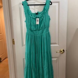 Green sleeveless dress from torrid with ruffles. Never worn with tags.